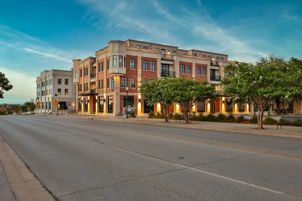 Ad Insight headquarters in Georgetown, Texas – brick and stone office building at 501 S Austin Ave